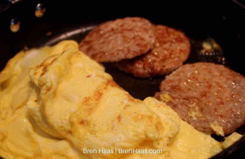 scramble eggs and sausage breakfast